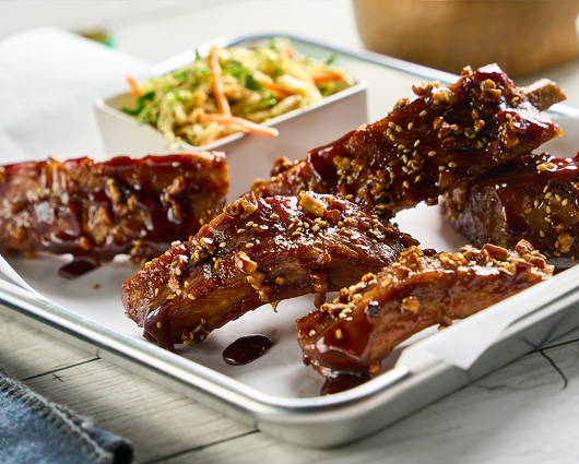 Pecan Endrusted Sticky Ribs with Ginger Slaw